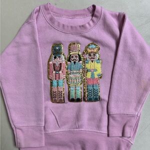 Pink Sweatshirt with Nutcracker Design